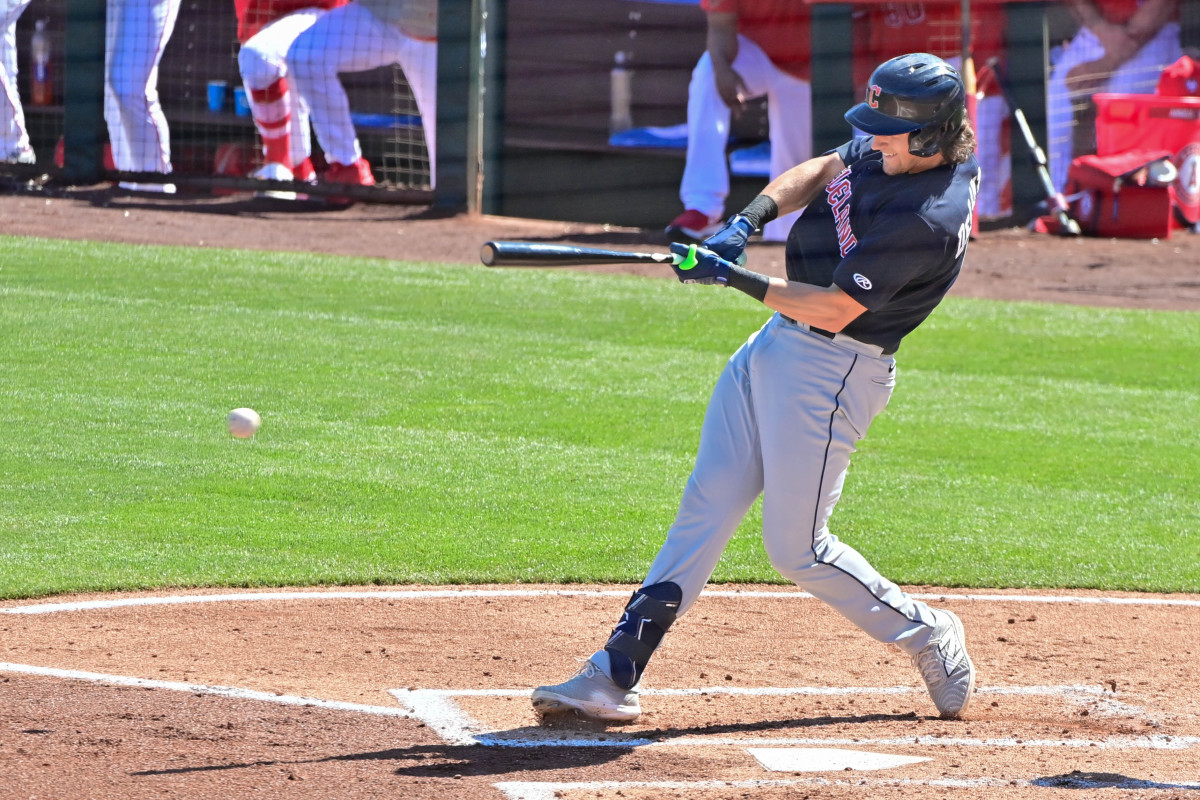 Feb 29, 2024; Tempe, Arizona, USA; Cleveland Guardians right fielder Chase DeLauter (6) grounds out in the third inning against the Los Angeles Angels during a spring training game at Tempe Diablo Stadium.